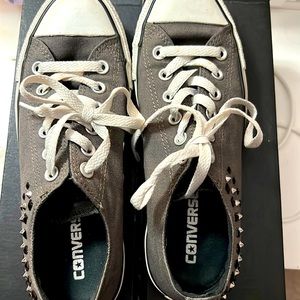 Converse size 8 women.  Size 6 men.  Gray with stud detail.